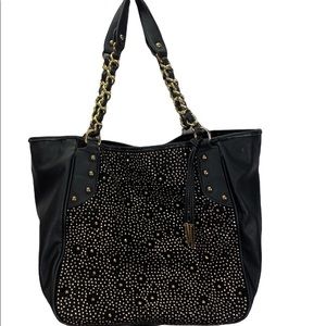 Carlos Santana black studded handbag.